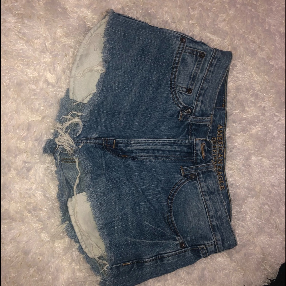 American eagle high rise distressed shorts.